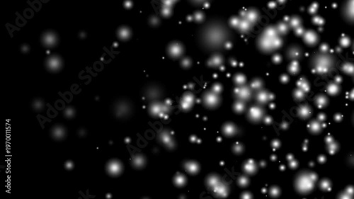 Falling glitter sparkles on black background slow motion animation festive celebrations and holidays