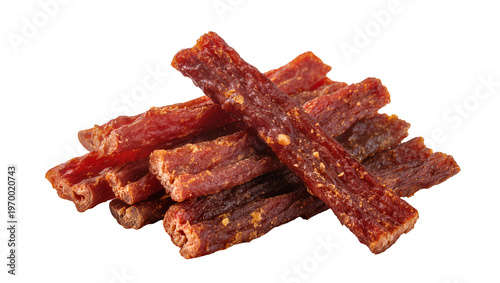 Schilderij op canvas Pile of savory dried beef jerky sticks, seasoned with pepper and spices