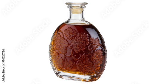 Photos Antique amber liquor bottle, intricately carved with detailed grape leaf pattern