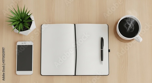Overhead shot of a minimalist workspace with coffee and a notebook.