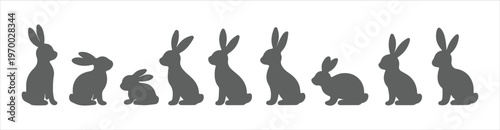 Rabbit silhouette vector set featuring various bunny poses including sitting jumping and standing silhouettes for minimalist logo design and seasonal spring graphics