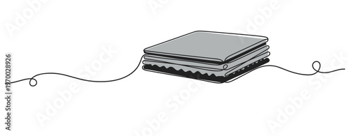 Stack of folded cloths resting on continuous line background