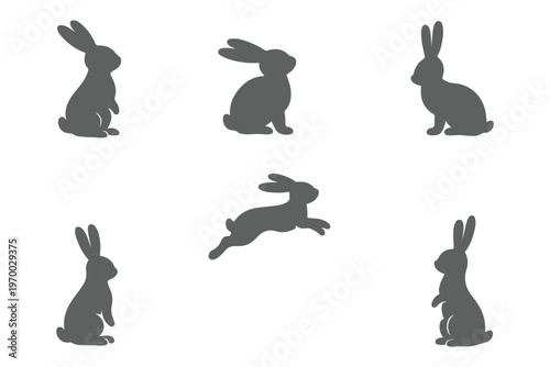 Collection of Easter bunny silhouettes set including jumping rabbits egg and cross icons for spring holiday celebration design isolated vector illustrations on white background 