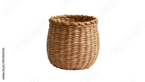 Fotografie Round woven wicker basket, natural tan hue displaying intricate texture
