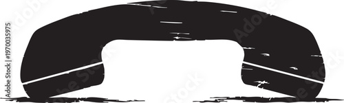 Black rotary phone receiver on a white background with scratches and marks