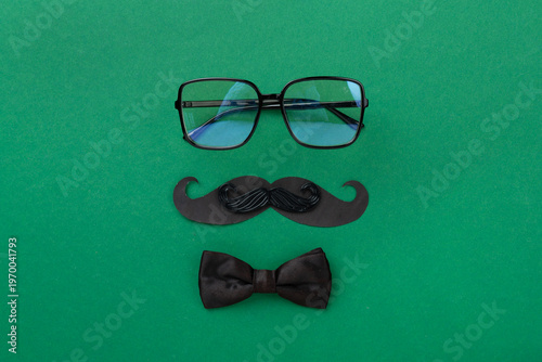 Happy Father's Day accessories on color background, top view