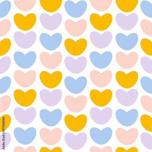 Vector seamless pattern with decorative hearts in cheerful pastel colors. Perfect for Valentine's Day, wrapping paper, accessories, and branding.