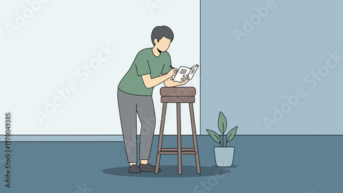 Man reading a book on a stool in a minimalist room with a plant