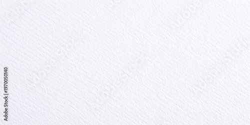A clean white paper texture background with a seamless blank canvas pattern on a rough grey surface material for a vintage grunge backdrop