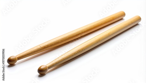Pair of wooden drumsticks on a white background.