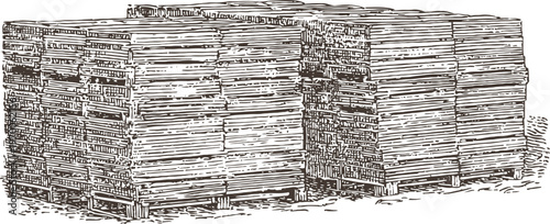 large stacks of wooden pallets arranged outdoors for industrial or warehouse use