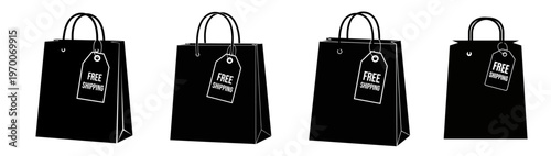 Four Black Shopping Bags with Free Shipping Tags Online Retail and E commerce Concept