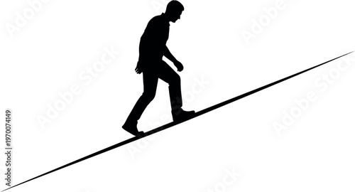 Silhouette of a man walking on a tightrope