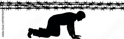 Silhouette of a person crawling under barbed wire