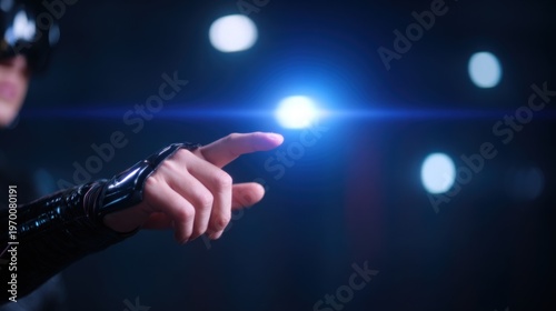 Futuristic hand interacting with virtual interface glowing blue light technology augmented reality digital future innovation connection metaverse experience