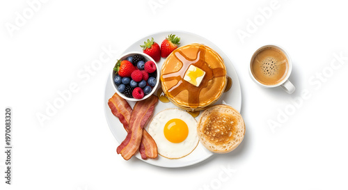 Delicious breakfast plate pancakes bacon eggs and berries for a perfect morning