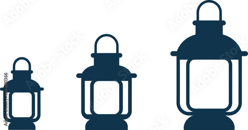 Three Dark Blue Lanterns of Different Sizes in a Row