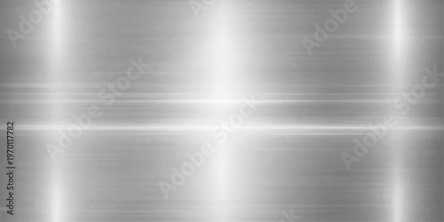 A seamless brushed silver aluminum texture featuring a polished metallic surface with a shiny stainless steel pattern and industrial gray reflection for a professional sheet material background