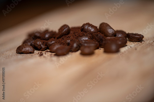 Roasted coffee beans macro background with shallow depth of field