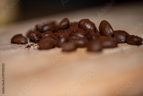 Roasted coffee beans macro background with shallow depth of field