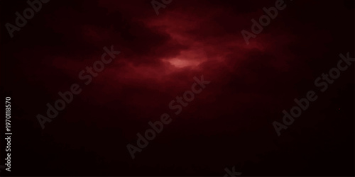 Abstract red and white smoke rising against a dark summer cloudscape with sunlight filtering through the windy atmosphere