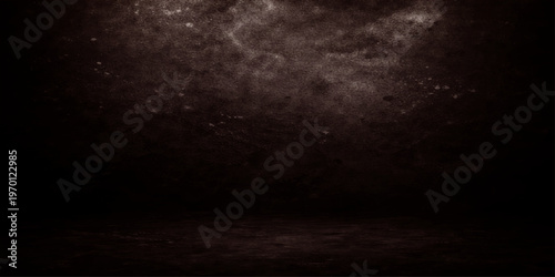 A dark vintage film projector lens projects a grunge film strip onto an old textured concrete wall backdrop with a rough black paper pattern