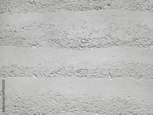 Photos Background of texture rammed white earth wall with uneven, rough, horizontal grain pattern