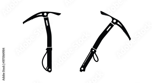 Two black ice axes displayed against a white background a dark silhouette