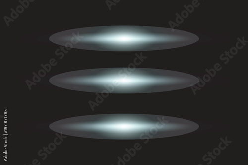 Three bright elliptical shapes on a dark background