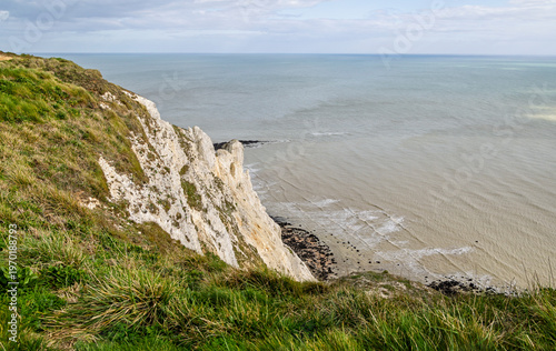 View out to sea from the top of Beachy Head with chalk cliffs in East Sussex, UK in March 2026