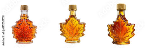 Three maple leaf shaped glass bottles filled with amber syrup isolated on a transparent background image