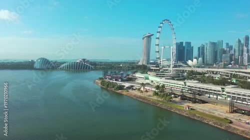 Marina bay, Singapore: Aerial view of famous island country and city-state - landscape panorama of Southeast Asia from above
