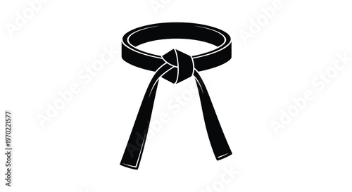 A striking black belt is displayed against a white background showcasing a traditional martial arts symbol silhouette