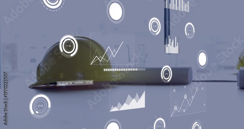Showing yellow hard hat resting on planning workspace table with rolled plans and HUD graphics