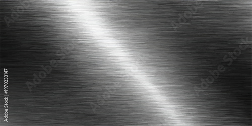 A Close-up on a sleek, metallic surface. The image showcases the smooth texture and subtle play of light across the brushed metal, creating a sense of modernity and industrial design.
