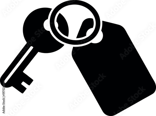 A key attached to a keyring with a magnifying glass symbol on it.