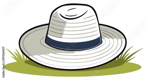 Elegant white panama hat with dark blue ribbon on natural green lawn inviting sunny summer relaxation