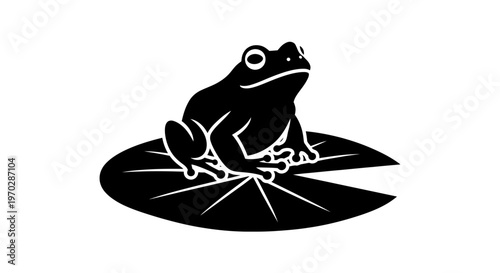 Black Silhouette of a Frog Sitting on a Lily Pad.