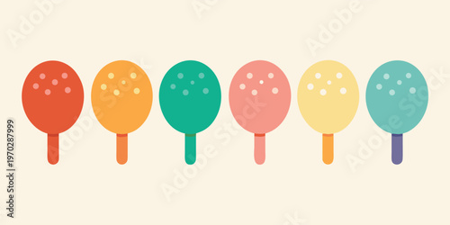 Six solid colored popsicles with cheerful sprinkles line up perfectly.