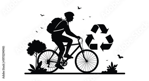 Cyclist with backpack rides past recycling symbol striking black silhouette