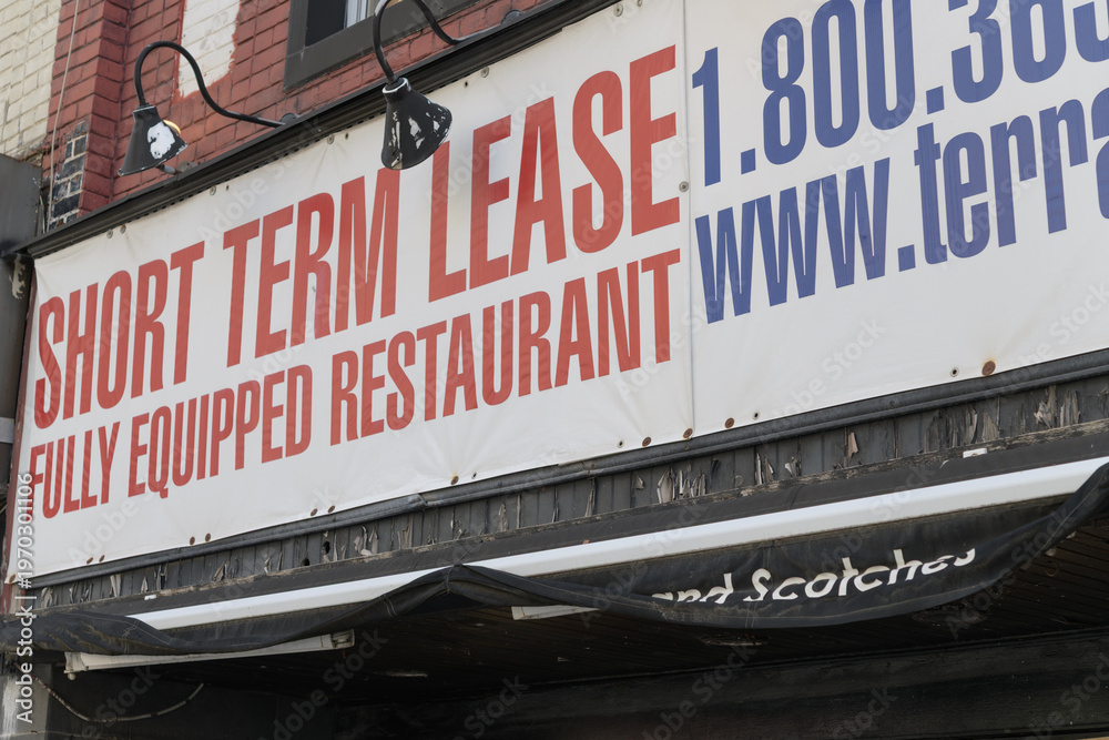 Naklejka premium old ghost banner sign for Short Term Lease, Fully Equipped Restaurant, Yonge St, Toronto