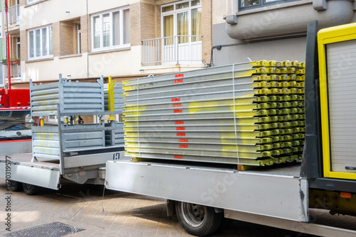 Renovation and repair in the city. Metal scaffold for the facade of old or modern house .