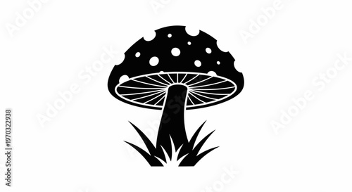 Stylized Black and White Mushroom Icon with Grass.