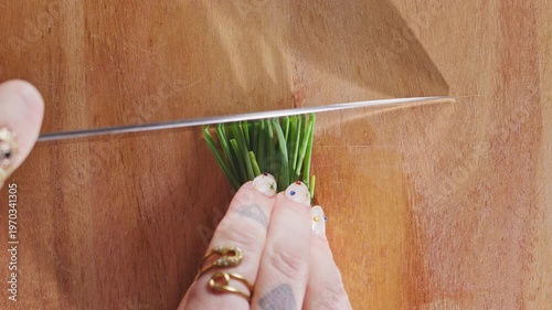 Wallpaper Mural Fresh chives finely chopped on a wooden cutting board. Torontodigital.ca