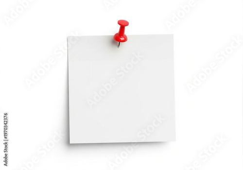 A blank sheet of paper pinned with a red pushpin on a light surface