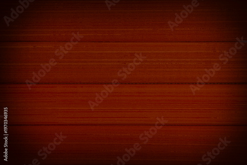 lank backdrop with shadowed edges: close up of wall made of bamboo planks
