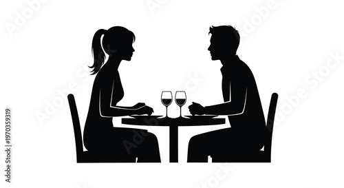 Couple enjoying a romantic dinner together depicted in black silhouette