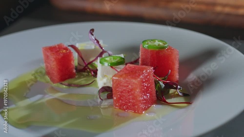 Wallpaper Mural Watermelon, feta, and jalapeno salad drizzled with olive oil on a white plate. Torontodigital.ca