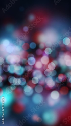 Dynamic blurred bokeh background with vibrant red, blue and white light circles. Soft focus motion creates glowing depth, dreamy atmosphere and abstract flowing light. Vertical seamless  looping.