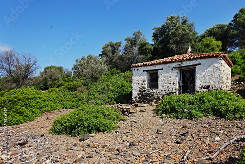 Greece - view of the coast of Monolia island near  the town of Kamena Vourla on the mainland